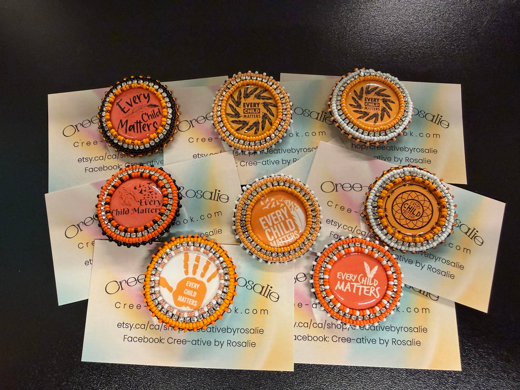 Every child matter beaded pins