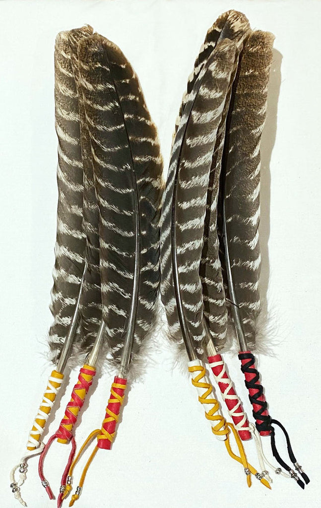 TURKEY FEATHERS WRAPPED IN LEATHER